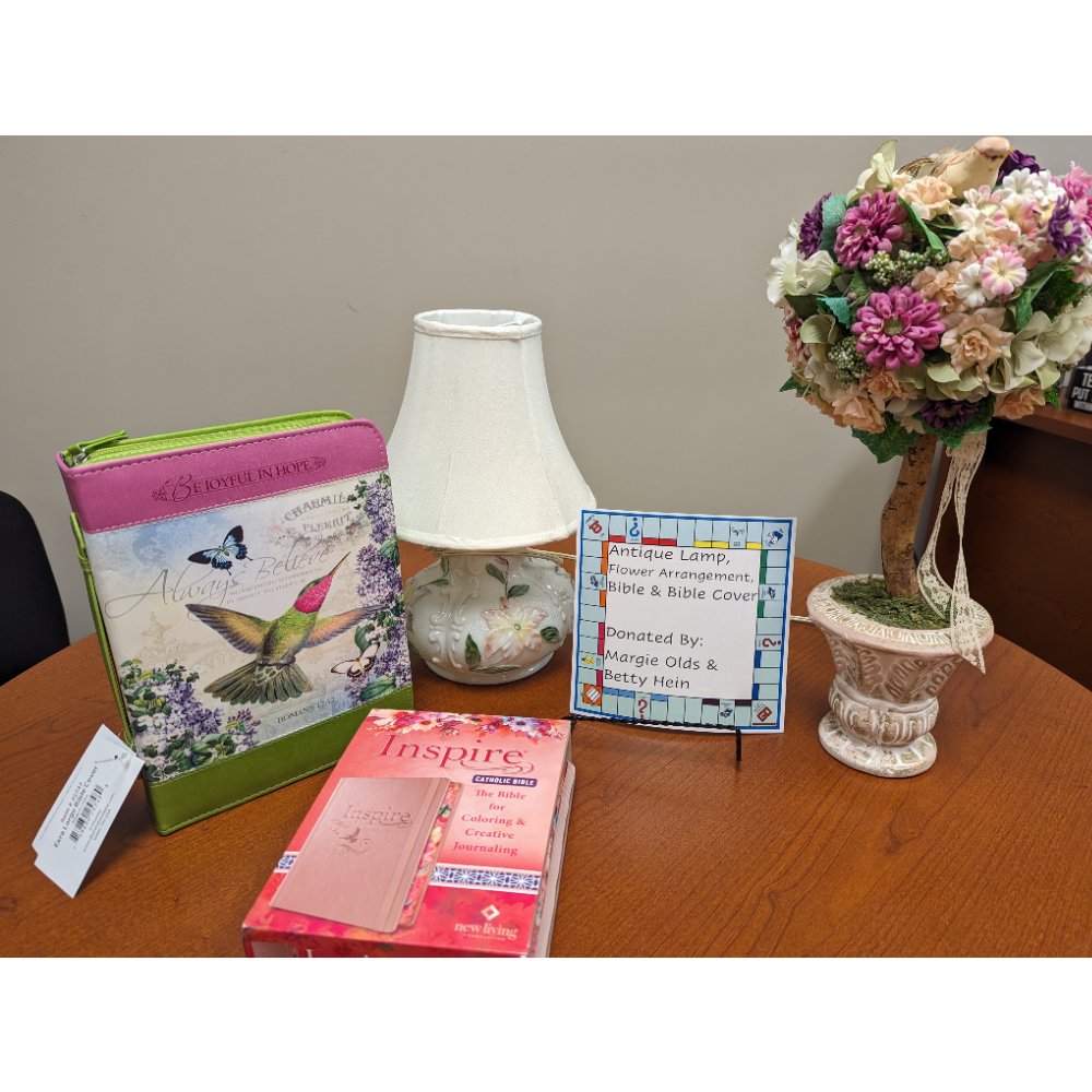 Antique Lamp, Flower Arrangement, and Bible with Bible Cover
