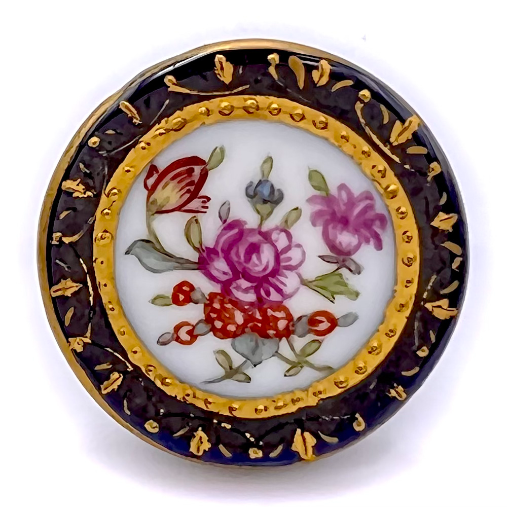 Transfer and painted porcelain button of flowers.