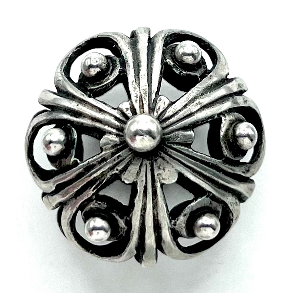 Peasant silver ball shape with openwork button. 