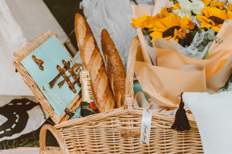 Gift basket with bread and flowers