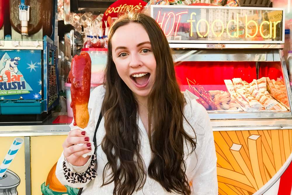 Girl enjoying food at a fundraiser