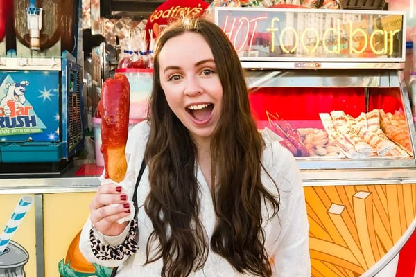 Girl enjoying food at a fundraiser