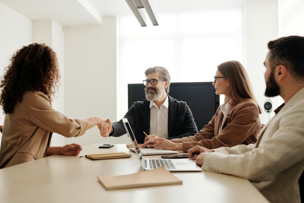 NPO shaking hands with donor