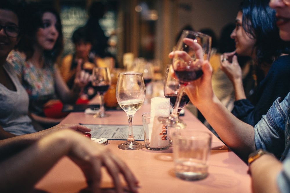 People enjoying drinking wine