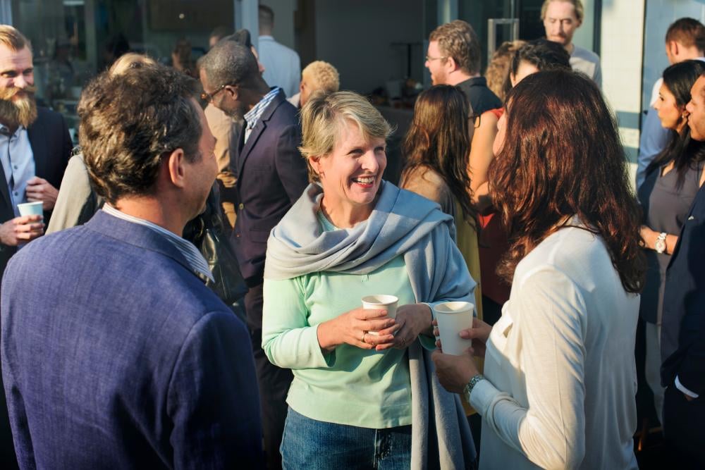 People talking at a fundraiser