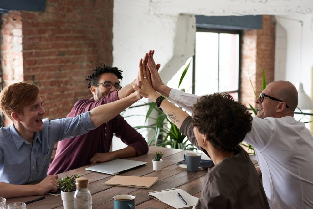 Team high-fiving