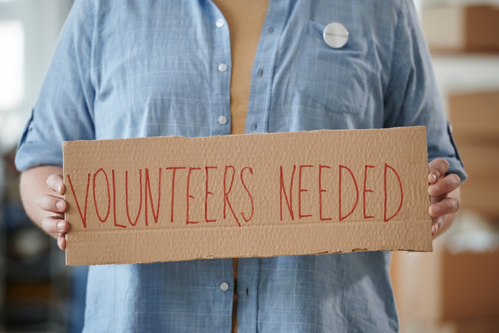 Volunteers needed sign