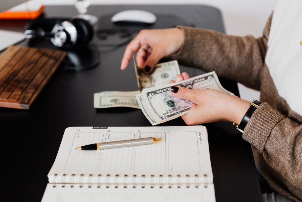 Woman counting cash