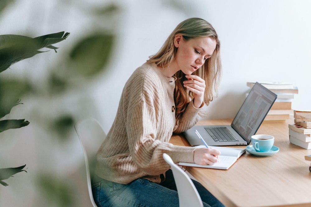 Woman doing prospect research on computer