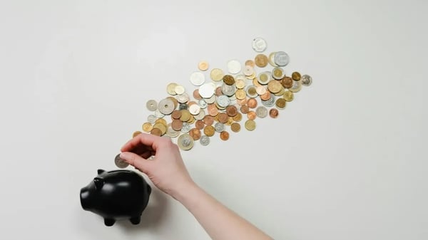 Piggy bank being filled
