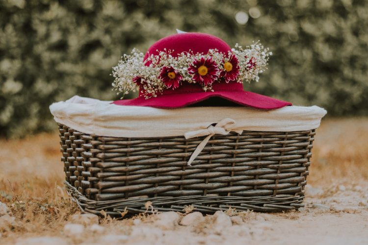Gift basket with hat and flowers